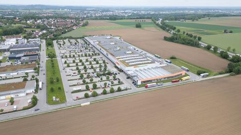 Luftbild InCenter in Landsberg am Lech Customer Story, InCenter, Fachmarktzentrum, Ladeinfrastruktur, E-Mobilität, Ladepark, Pfalzwerke